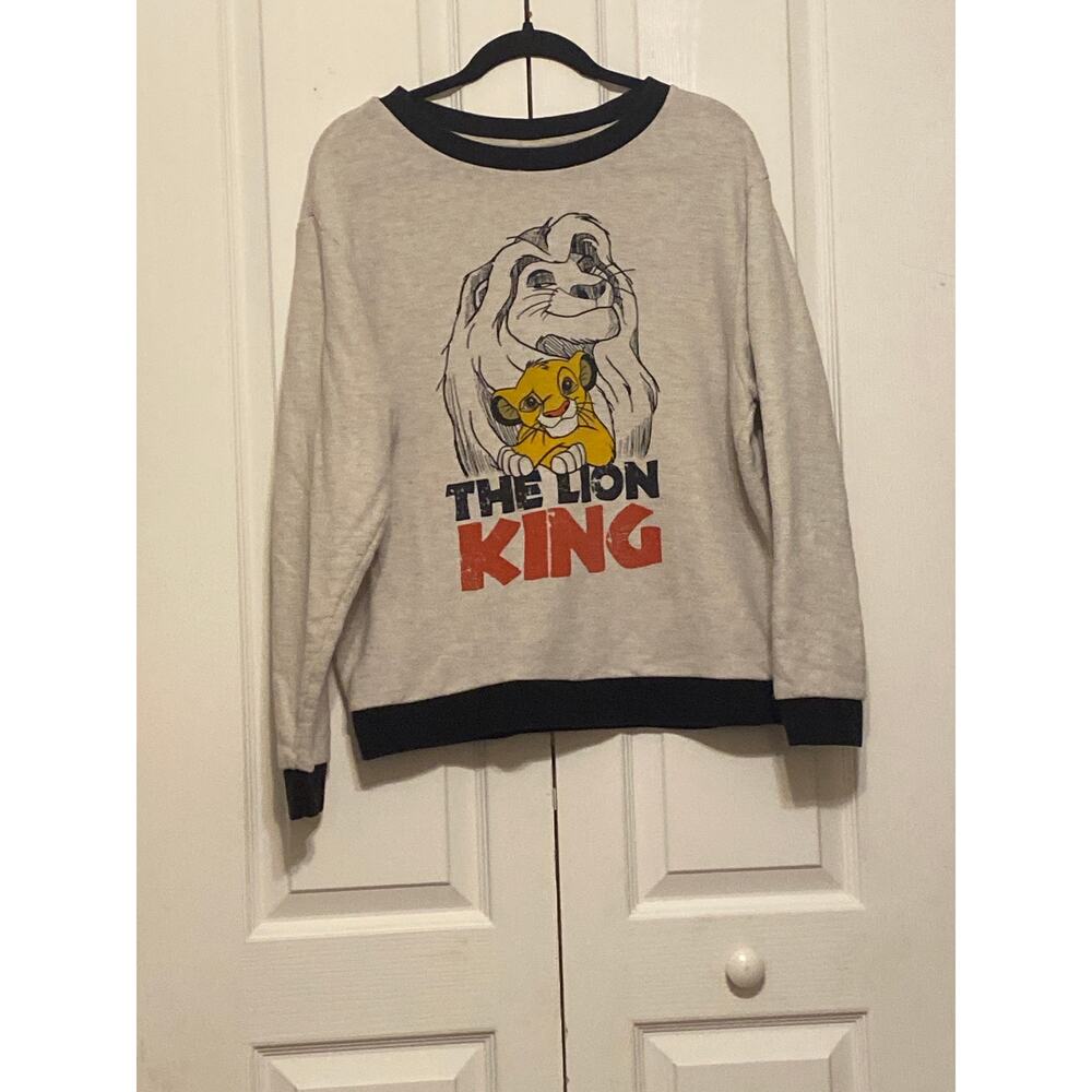Disney lion King sweater beige with black trim size extra large